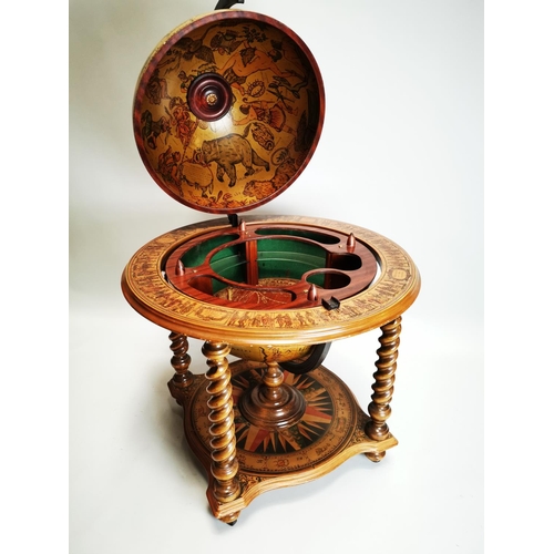 119 - Exceptional quality Terrestrial globe in the form of a drink's cabinet { 104cm H X 75cm Dia }.