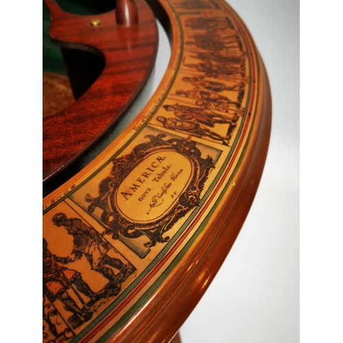 119 - Exceptional quality Terrestrial globe in the form of a drink's cabinet { 104cm H X 75cm Dia }.