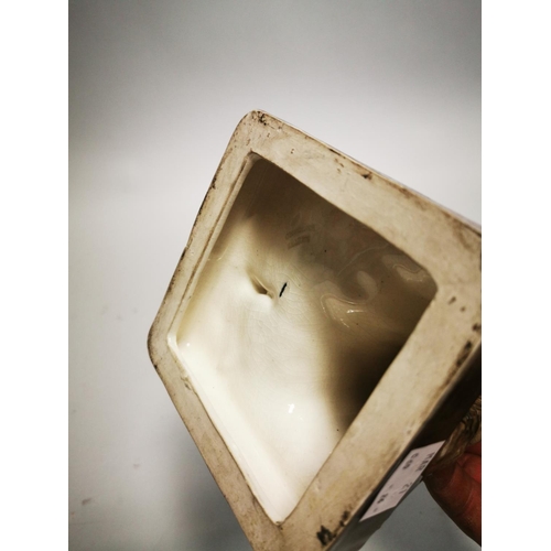 121 - The Beer Drinker caricature in the form of a ceramic candlestick.  {  30cm H X 14cm Sq. }.