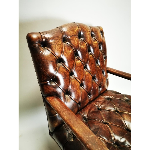 125 - 20th. C. deep buttoned leather upholstered and mahogany swivel desk chair. { 103 H cm X 72cm W X 65c... 
