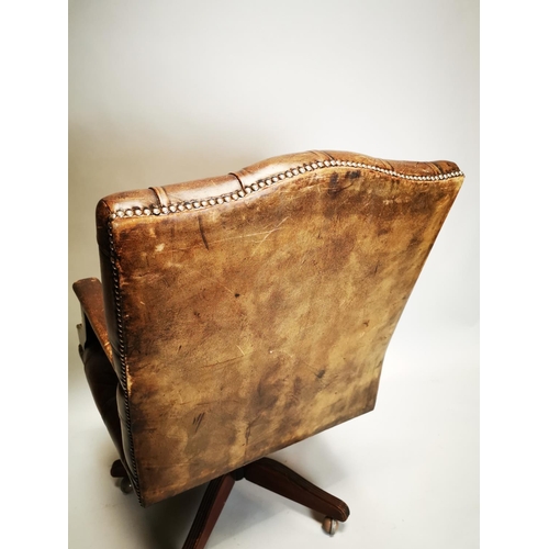 125 - 20th. C. deep buttoned leather upholstered and mahogany swivel desk chair. { 103 H cm X 72cm W X 65c... 