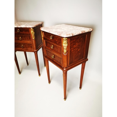 128 - Pair of exceptional quality 19th. C. French mahogany bedside lockers the rouge marble tops above a d... 