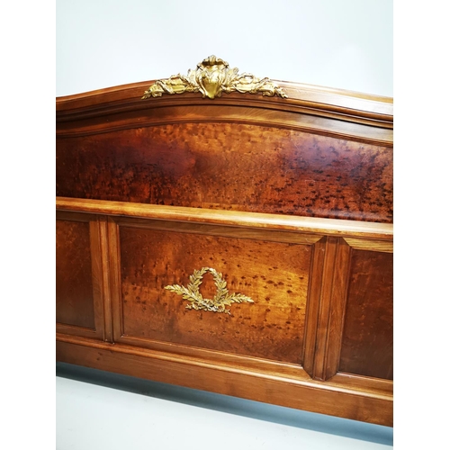 129 - Exceptional quality 19th. C. French mahogany bed decorated with gilded mounts raised on four turned ... 