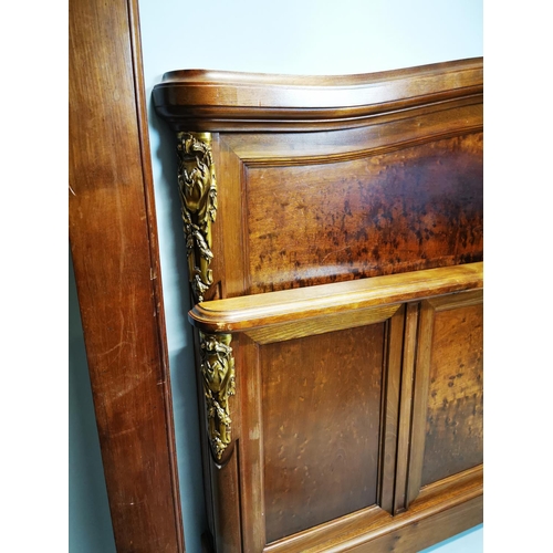 129 - Exceptional quality 19th. C. French mahogany bed decorated with gilded mounts raised on four turned ... 