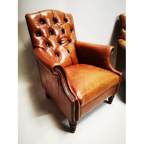 135 - Pair of exceptional quality hand died English leather deep buttoned arm chairs on turned walnut legs... 