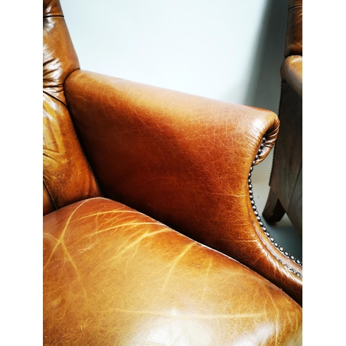 135 - Pair of exceptional quality hand died English leather deep buttoned arm chairs on turned walnut legs... 