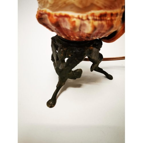 138 - Gilded metal lamp with carved shell shade in the Art Deco style {20 cm H x 11 cm W x 11 cm D}.