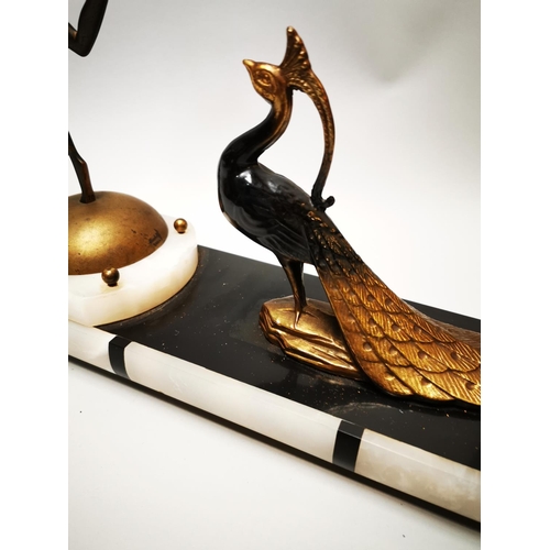 139 - Gilded metal and bronze centre piece decorated with peacocks and dancing lady in the Art Deco style ... 