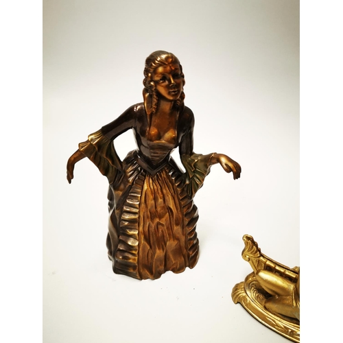 140 - Three gilded metal figures in the Art Deco style {23 cm H, 21 cm H and 12 cm H}.