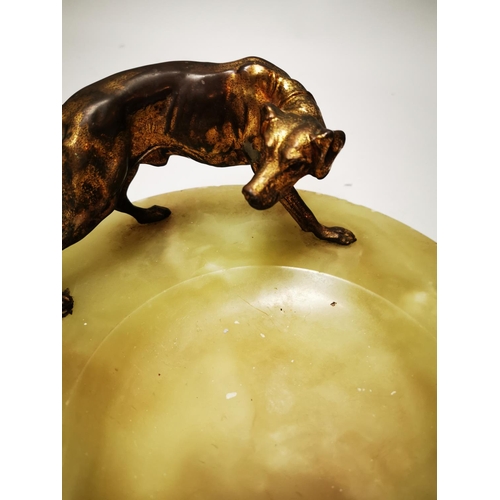 141 - Gilded bronze dog change tray mounted on onyx base in the Art Deco style {13 cm H x 25 cm W}.