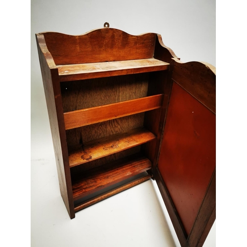 144 - 1930s mahogany wall cabinet with single mirrored door {66 cm H x 44 cm W x 14 cm D}.