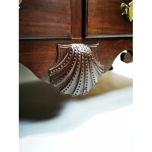149 - Irish Georgian mahogany chest on stand with two drawers and carved shell in the frieze on cork pad f... 