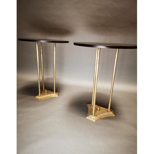 150 - Pair of exceptional quality brass lamp tables with ebonised circular top {74 cm H x 56 cm Dia.}.