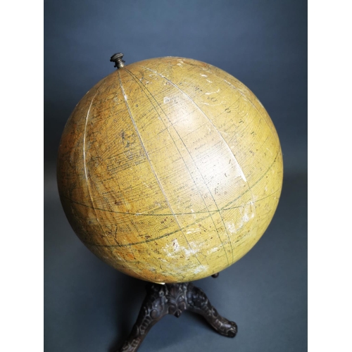 151 - Early 20th C. world globe on decorative cast iron stand {52 cm H x 30 cm Dia.}.