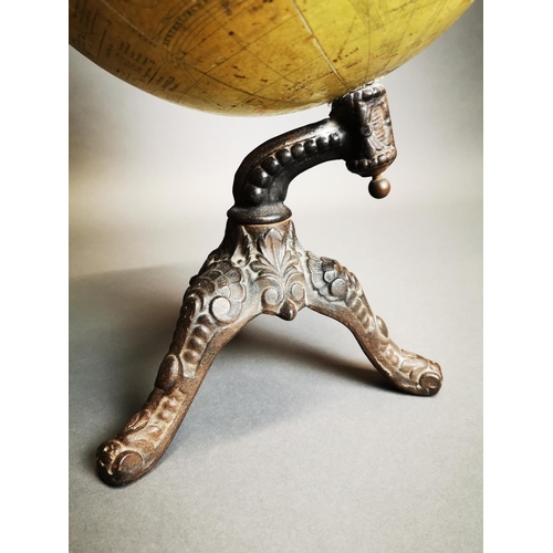 151 - Early 20th C. world globe on decorative cast iron stand {52 cm H x 30 cm Dia.}.