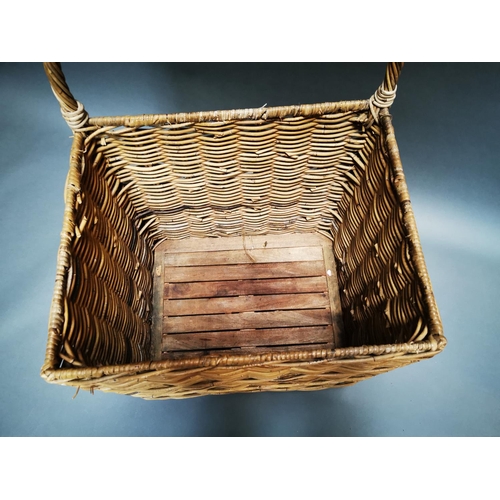 164 - Early 20th C. wicker log basket on wheels {96 cm H x 54 cm W x 44 cm D}.