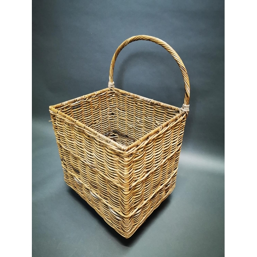 164 - Early 20th C. wicker log basket on wheels {96 cm H x 54 cm W x 44 cm D}.