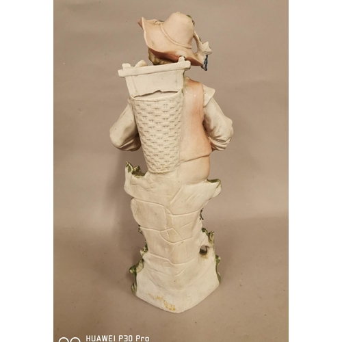 166 - Bisque figure of a Young Boy {28 cm H x 15 cm W}.