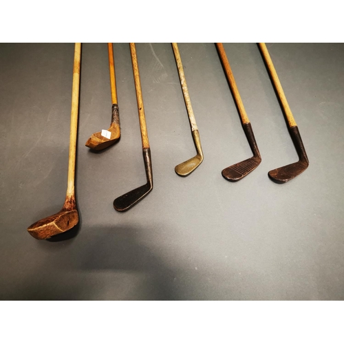168 - Collection of early 20th. C. golf clubs.