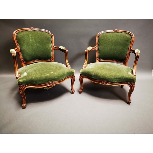 233 - Pair of late 19th C. carved walnut and green velvet upholstered arm chairs on cabriole legs {80 cm H... 