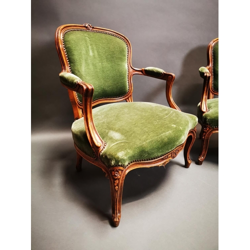 233 - Pair of late 19th C. carved walnut and green velvet upholstered arm chairs on cabriole legs {80 cm H... 