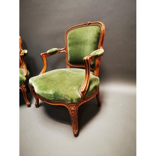 233 - Pair of late 19th C. carved walnut and green velvet upholstered arm chairs on cabriole legs {80 cm H... 