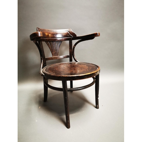 239 - Early 20th C. bentwood arm chair with embossed seat {72 cm H x 62 cm W x 57 cm D}.