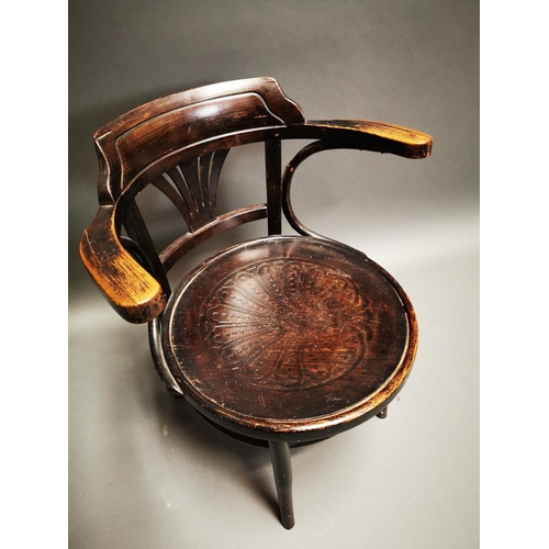 239 - Early 20th C. bentwood arm chair with embossed seat {72 cm H x 62 cm W x 57 cm D}.