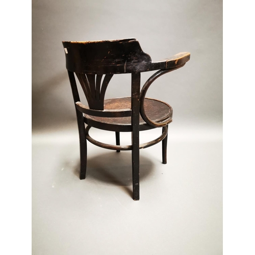 239 - Early 20th C. bentwood arm chair with embossed seat {72 cm H x 62 cm W x 57 cm D}.