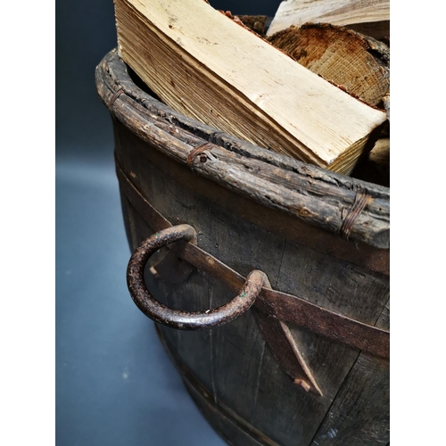 241 - Early 20th C. metal bound log bucket with wrought iron handle {59 cm H x 47 cm W x 46 cm D}.