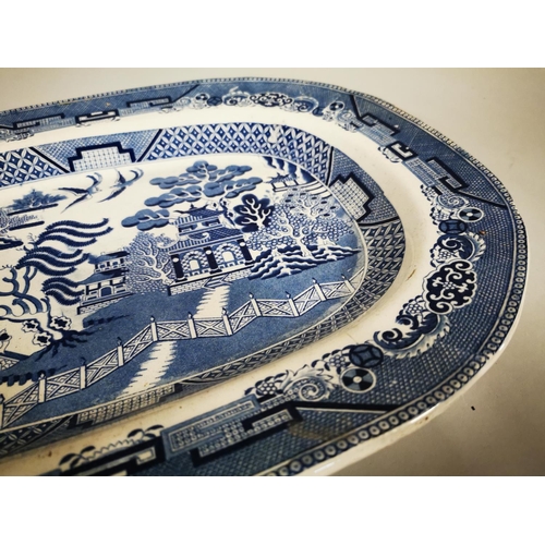 247 - 19th C. Willow patterned meat platter { 36cm W X 46cm D }.