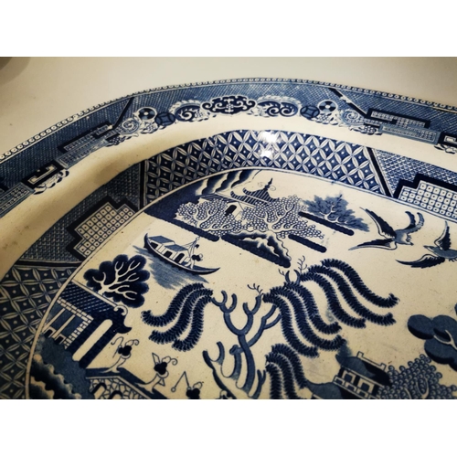 247 - 19th C. Willow patterned meat platter { 36cm W X 46cm D }.