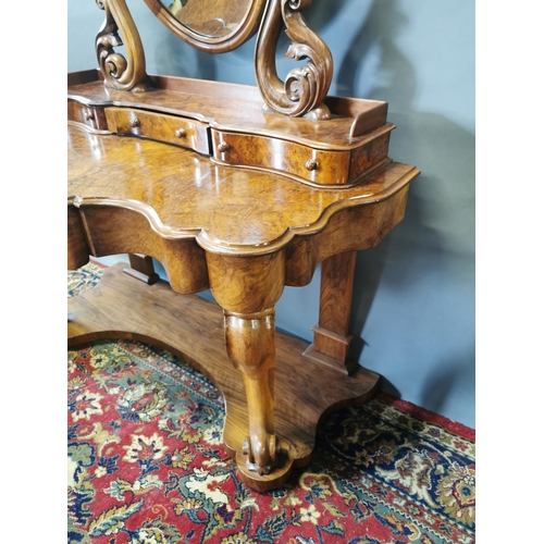 255A - Victorian walnut dressing table on cabriole legs and platform base {147 cm H x 124 cm W x 57 cm D}.