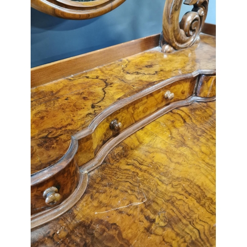 255A - Victorian walnut dressing table on cabriole legs and platform base {147 cm H x 124 cm W x 57 cm D}.