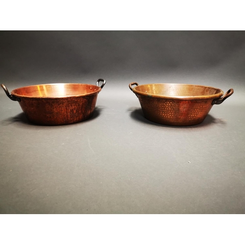261 - Pair of early 20th C. hand beaten copper preserving pans with wrought iron handles {17 cm H x 47 cm ... 