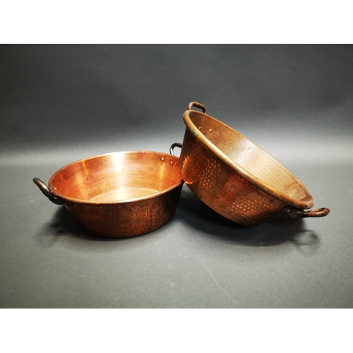 261 - Pair of early 20th C. hand beaten copper preserving pans with wrought iron handles {17 cm H x 47 cm ... 
