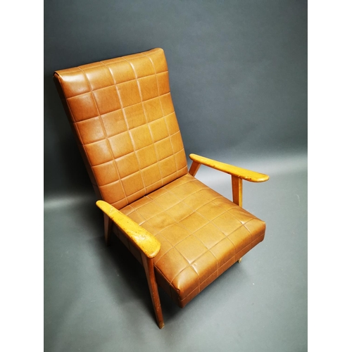 265 - Mid-century walnut and vinyl easy chair {94 cm H x 63 cm W x 80 cm D}.