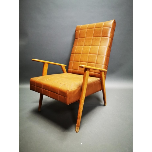 265 - Mid-century walnut and vinyl easy chair {94 cm H x 63 cm W x 80 cm D}.