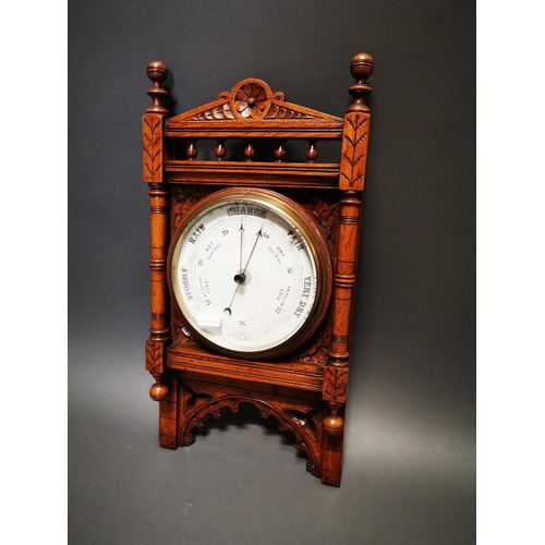 273 - Good quality Edwardian carved oak barometer {56 cm H x 29 cm W}.
