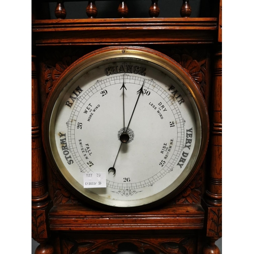 273 - Good quality Edwardian carved oak barometer {56 cm H x 29 cm W}.