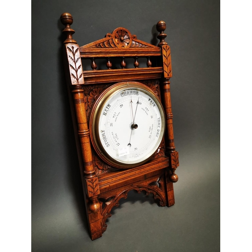 273 - Good quality Edwardian carved oak barometer {56 cm H x 29 cm W}.