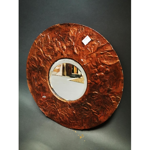 274 - Early 20th C. embossed wall mirror decorated with ivy leaf {45 cm Dia.}.