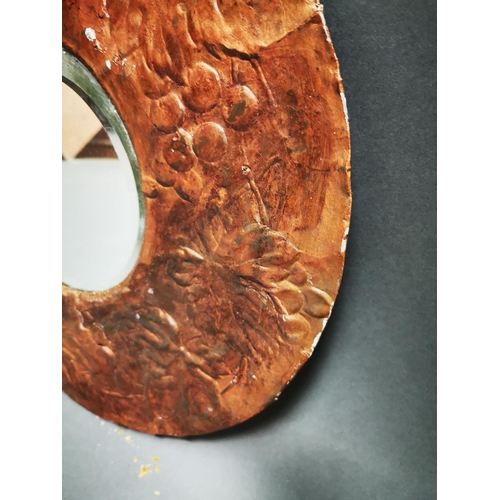 274 - Early 20th C. embossed wall mirror decorated with ivy leaf {45 cm Dia.}.