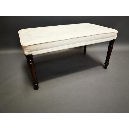 275 - 19th C. mahogany and upholstered foot stool {46 cm H x 94 cm W x 54 cm D}.