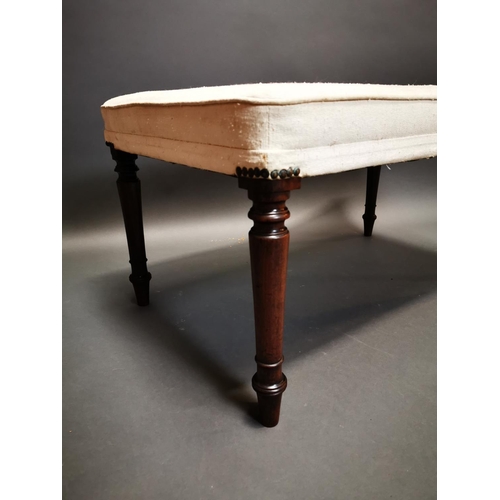 275 - 19th C. mahogany and upholstered foot stool {46 cm H x 94 cm W x 54 cm D}.