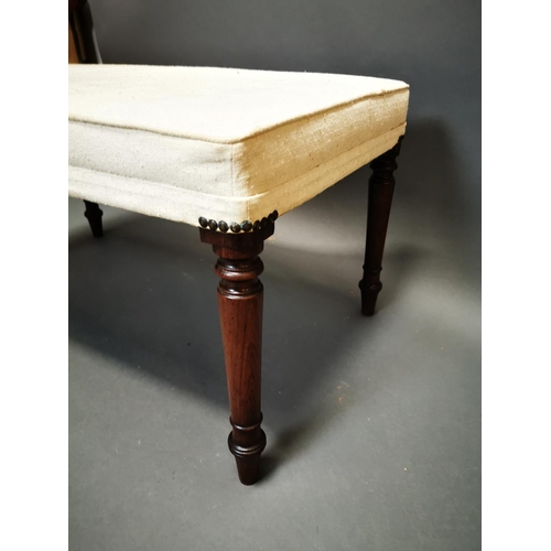 275 - 19th C. mahogany and upholstered foot stool {46 cm H x 94 cm W x 54 cm D}.