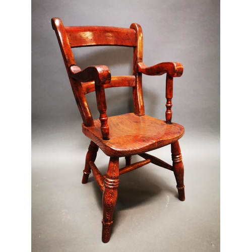 278 - 19th C. elm child's chair {62 cm H x 35 cm W x 32 cm D}.