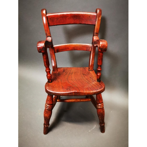 278 - 19th C. elm child's chair {62 cm H x 35 cm W x 32 cm D}.