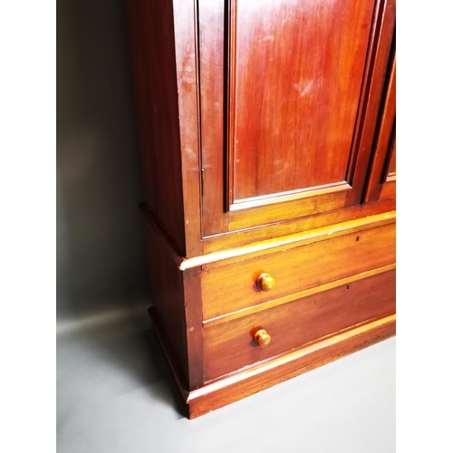 281 - 19th C. mahogany two door linen press with two long drawers in the base {212 cm H x 127 cm W x 48 cm... 