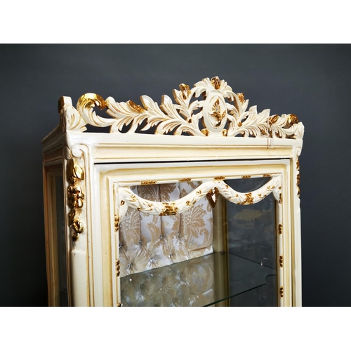282 - Decorative painted and gilded wooden display cabinet on cabriole legs {202 cm H x 68 cm W x 42 cm D}... 